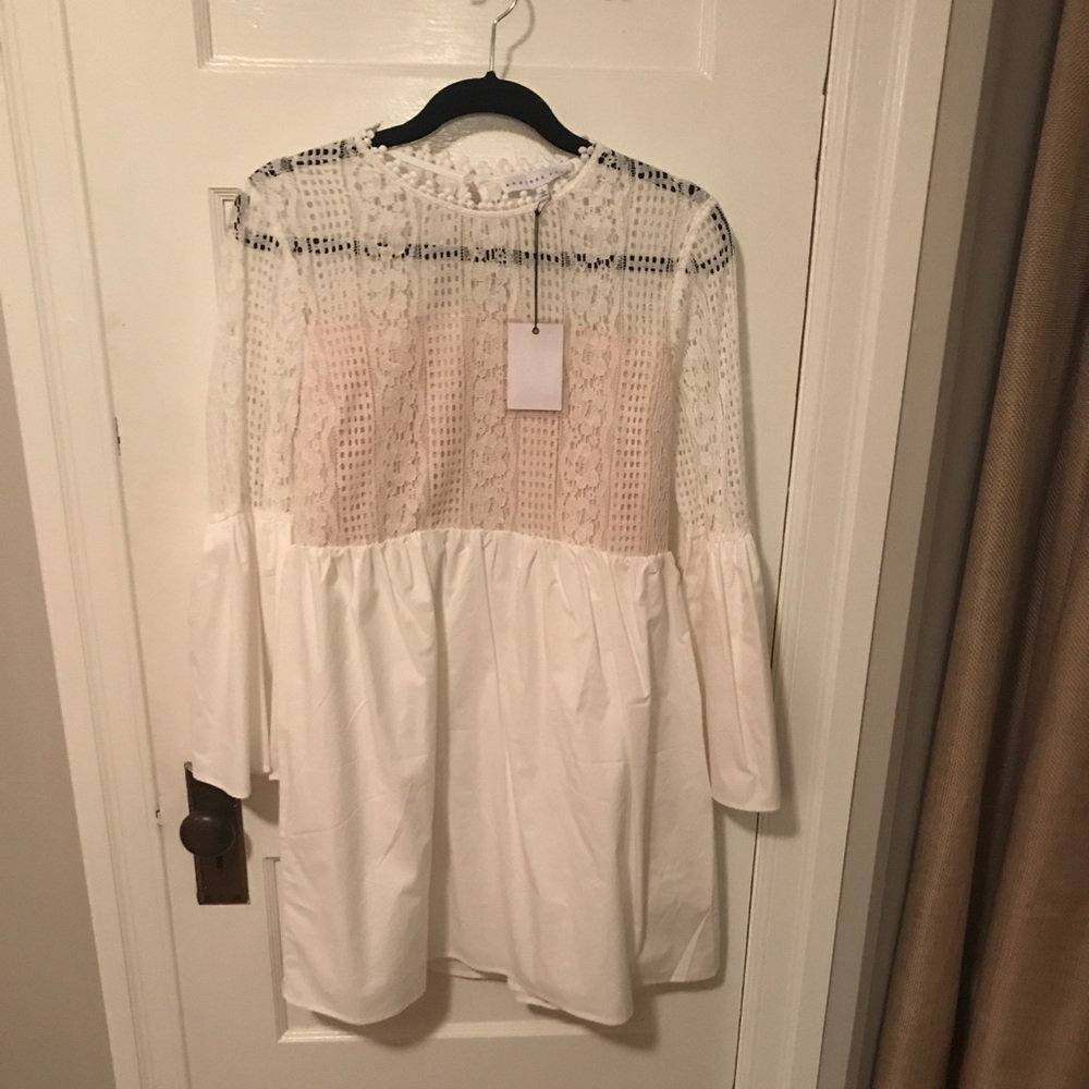 Never worn Endless Rose white backless dress